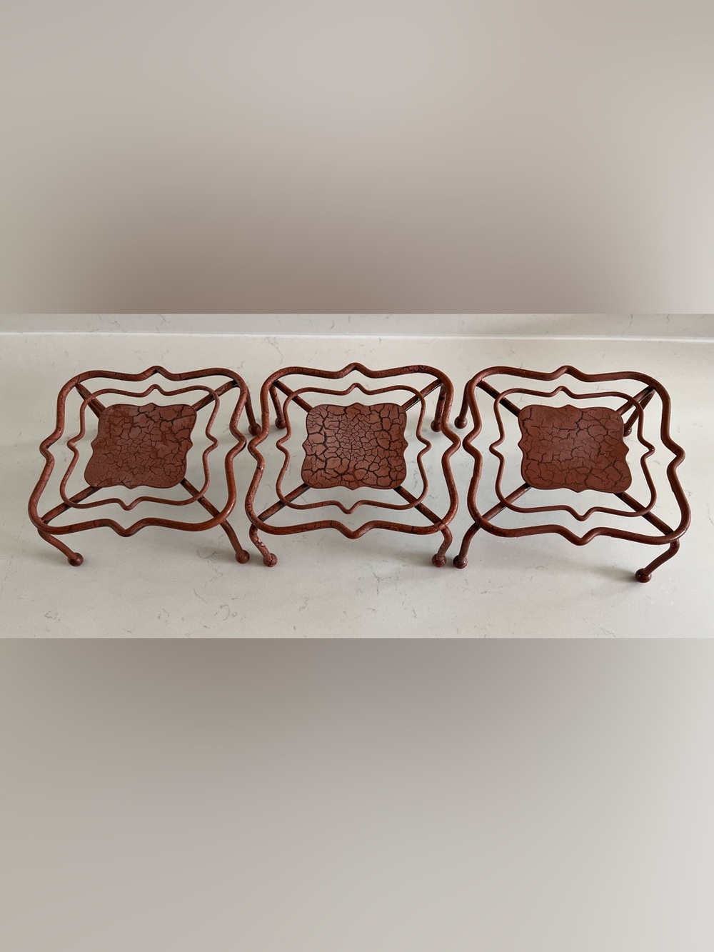 Set of (3) Brown Metal Display Riser Stands - Rustic Scroll Design 7"